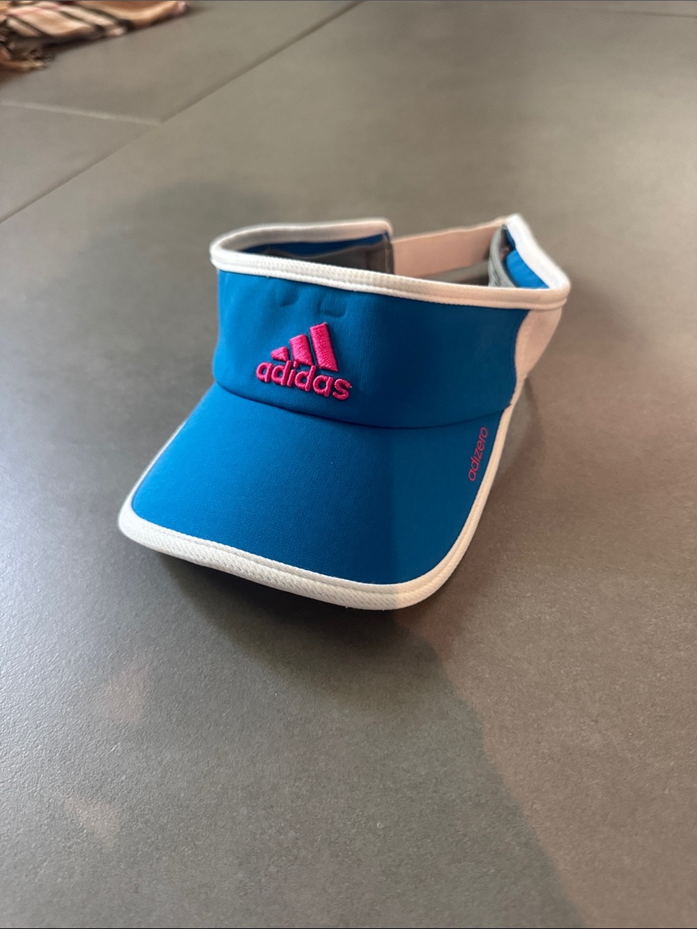 Women’s blue and pink Adidas visor